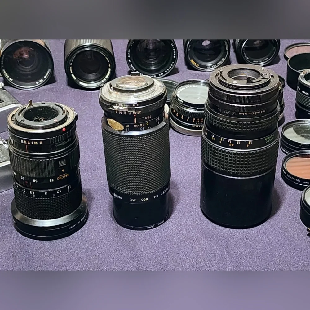 Two Canon cameras and lenses